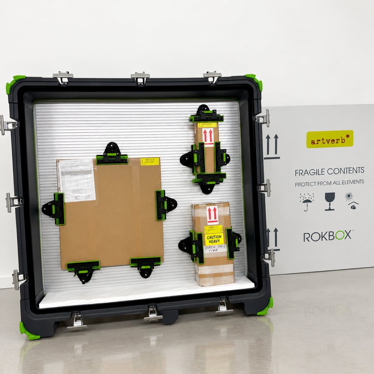 An open ROKBOX with works held in place by its brackets